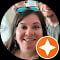 Smiling person with sunglasses and star badge