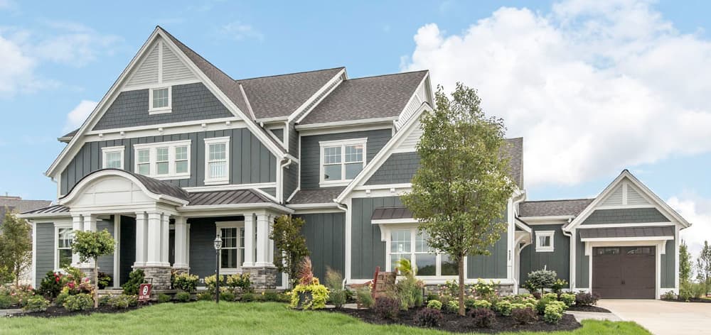 Large gray and white luxury home exterior