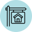House for sale icon in blue circle
